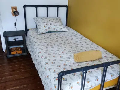 Un ou plusieurs lits dans un hébergement de l'établissement Gîte de l'Escapade