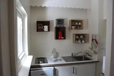 Cuisine ou kitchenette dans l'établissement L'Ancienne Boulangerie
