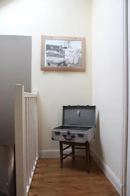 Télévision ou salle de divertissement dans l'établissement L'Ancienne Boulangerie