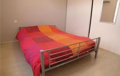 Un ou plusieurs lits dans un hébergement de l'établissement Nice Home In St Maixent Sur Vie