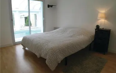 Un ou plusieurs lits dans un hébergement de l'établissement Nice Home In St Maixent Sur Vie