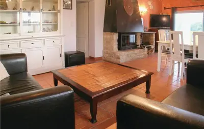 Télévision ou salle de divertissement dans l'établissement Nice Home In St Maixent Sur Vie