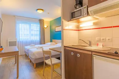 Cuisine ou kitchenette dans l'établissement Appart'City Classic La Roche sur Yon Centre