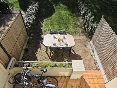 Jardin de l'établissement Confortable duplex avec terrasse, proche plage et commerces - St Brevin l'Océan - FR-1-364-43