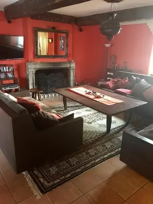 Coin salon dans l'établissement Gîte la Treille