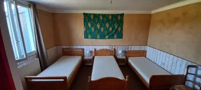 Un ou plusieurs lits dans un hébergement de l'établissement Maison de résidence d'artistes Vallons de l'Erdre 4 Pièces 9 pers