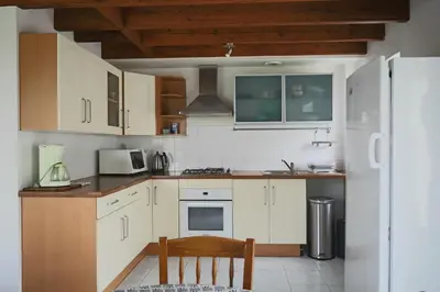 Cuisine ou kitchenette dans l'établissement Le Clousy- Gîte - CARQUEFOU Centre