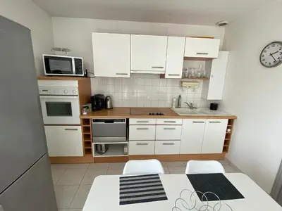 Cuisine ou kitchenette dans l'établissement Le Clousy- Gîte - CARQUEFOU Centre
