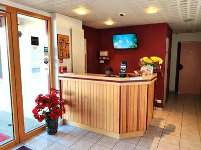 Télévision ou salle de divertissement dans l'établissement Hotel La Bosselle
