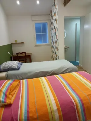Un ou plusieurs lits dans un hébergement de l'établissement Gîte de la Remaudière