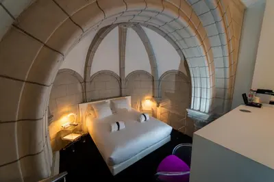 Un ou plusieurs lits dans un hébergement de l'établissement SOZO Hotel