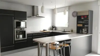 Cuisine ou kitchenette dans l'établissement Maison lumineuse