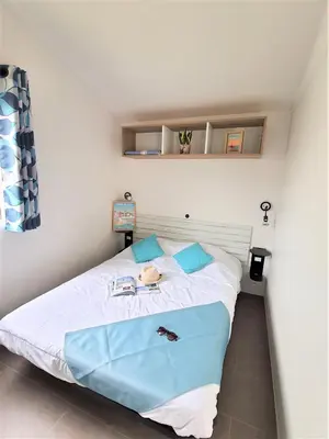 Un ou plusieurs lits dans un hébergement de l'établissement Camping la Plage