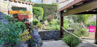 Jardin de l'établissement L' Esterlanges SUITE FAMILLE 2 chambres 4 personnes PROCHE PUYduFOU