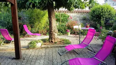 Jardin de l'établissement L' Esterlanges SUITE FAMILLE 2 chambres 4 personnes PROCHE PUYduFOU
