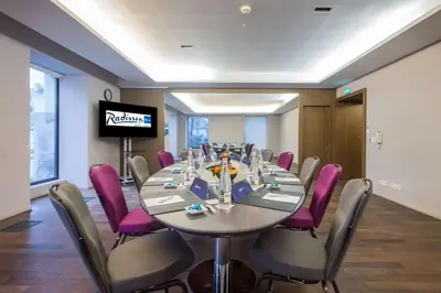 Télévision ou salle de divertissement dans l'établissement Radisson BLU Hotel Nantes