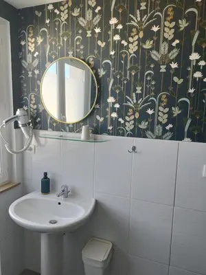 Salle de bains dans l'établissement Hotel Restaurant L'Atlantique