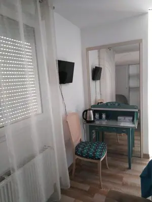 Télévision ou salle de divertissement dans l'établissement Chambre d'Hôtes du Bois Joli