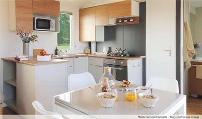 Cuisine ou kitchenette dans l'établissement Camping Officiel Siblu Le Bois Masson
