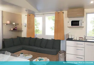 Cuisine ou kitchenette dans l'établissement Camping Officiel Siblu Les Pierres Couchees