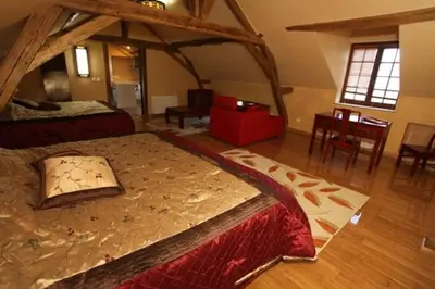 Un ou plusieurs lits dans un hébergement de l'établissement Château de Belle Poule