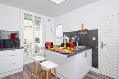 Cuisine ou kitchenette dans l'établissement Hypercentre 9 rue de la ROE