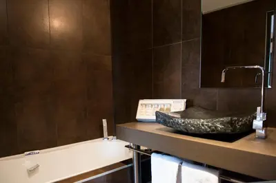Salle de bains dans l'établissement Le Domaine des Lys