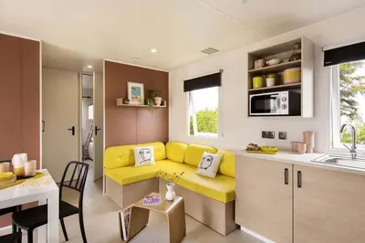 Cuisine ou kitchenette dans l'établissement Camping Le Ragis