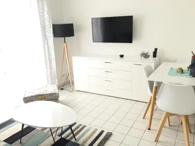 Télévision ou salle de divertissement dans l'établissement Gîte Club House 2 & 3 Gîte CARQUEFOU Centre