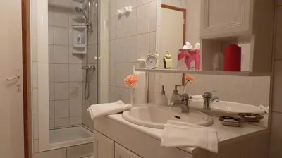 Salle de bains dans l'établissement La Trémière