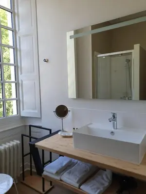 Salle de bains dans l'établissement Château du Bois de La Noe