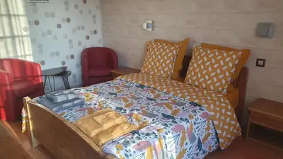 Un ou plusieurs lits dans un hébergement de l'établissement CHAMBRE D'HÔTES 20 MN PUY DU FOU