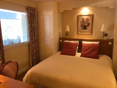 Un ou plusieurs lits dans un hébergement de l'établissement SWING RESIDENCE GOLF LA BAULE