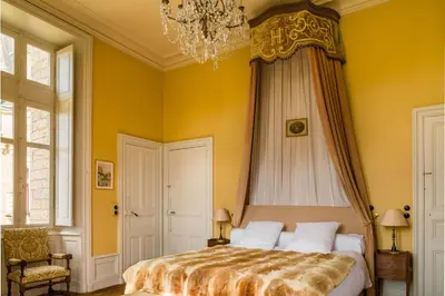 Un ou plusieurs lits dans un hébergement de l'établissement Chateau LE BROSSAY