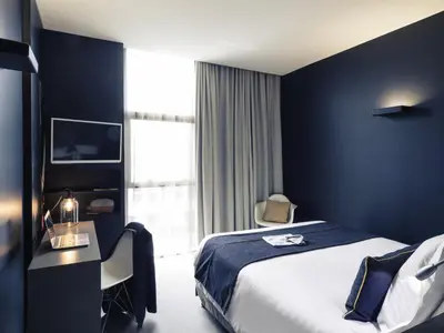 Un ou plusieurs lits dans un hébergement de l'établissement Hôtel Mercure Nantes Ouest Saint-Herblain Zenith
