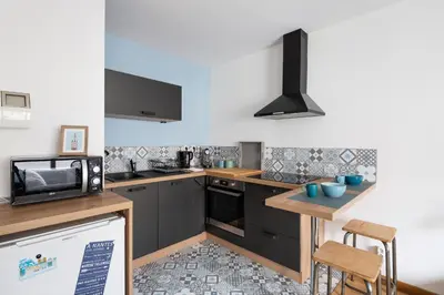 Cuisine ou kitchenette dans l'établissement Nelson by Cocoonr