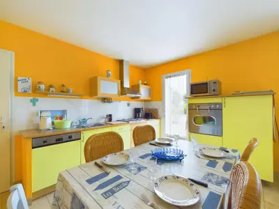 Cuisine ou kitchenette dans l'établissement Maison avec jardin - Entre plage et rivière