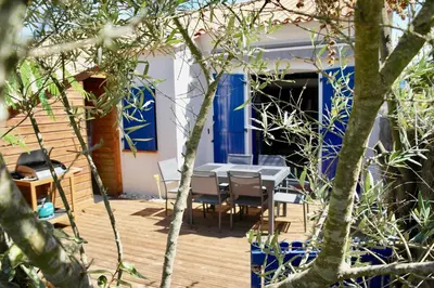 Jardin de l'établissement Maison pour 5, proche plage, piscine commune
