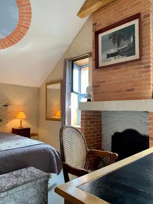 Coin salon dans l'établissement Chambres d'Hôtes Le Clos des 3 Rois