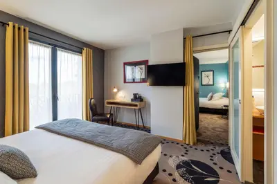 Un ou plusieurs lits dans un hébergement de l'établissement Best Western Plus Hotel De La Regate-Erdre