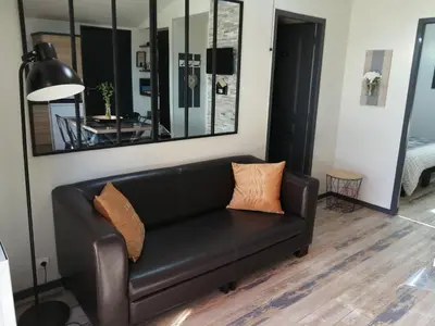 Coin salon dans l'établissement GITE AUX P'TITS OIGNONS