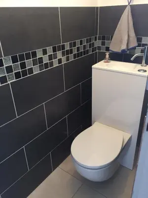 Salle de bains dans l'établissement Les Palmiers