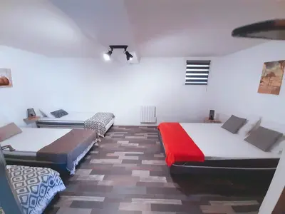 Un ou plusieurs lits dans un hébergement de l'établissement Gîte du marié à 7mn du puy du F0U