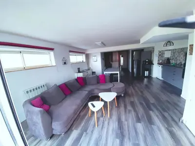 Coin salon dans l'établissement Gîte du marié à 7mn du puy du F0U