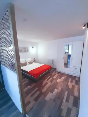 Un ou plusieurs lits dans un hébergement de l'établissement Gîte du marié à 7mn du puy du F0U