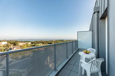 Balcon ou terrasse dans l'établissement Appart'City Confort Saint-Nazaire Océan