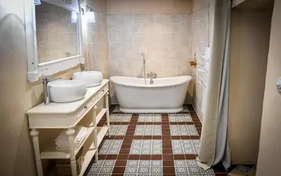 Salle de bains dans l'établissement Château de la Grand'cour