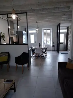 Coin salon dans l'établissement GITE IZALIN AVEC SPA A 20 min du Puy du Fou