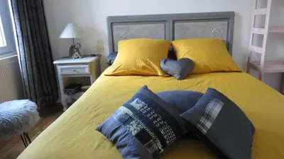 Un ou plusieurs lits dans un hébergement de l'établissement Domaine des fées
