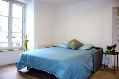 Un ou plusieurs lits dans un hébergement de l'établissement Appartement Amalfi Hyper Centre
